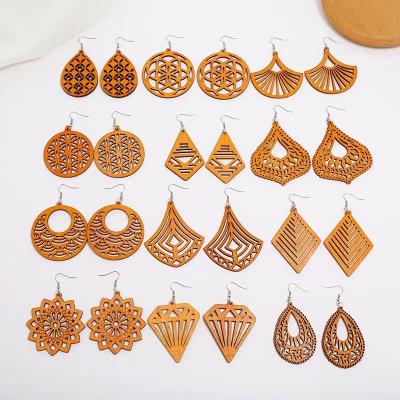 China Luxury Exaggerated Geometric Round Wooden Earrings Shape Wooden Earrings Hawaiian Wholesale Drop Earings for sale