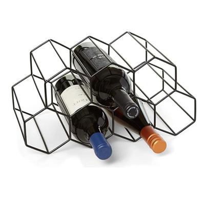 China MINGCAN Honeycomb Mini Cute Champagne Hexagon 9 Bottles Metal Viable Wine Rack for sale