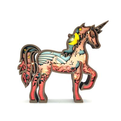 China Ornament Unicorn Figurines And Statues Multilayer Forest Unicorn Sculpture Silhouette Unicorn Wood Carving Animal Decor From China Mingcan for sale