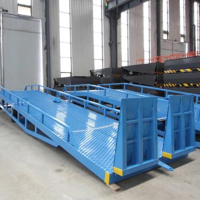 China Hotels Forklift Container Loading Mobile Hydraulic Dock Loading Ramp for sale