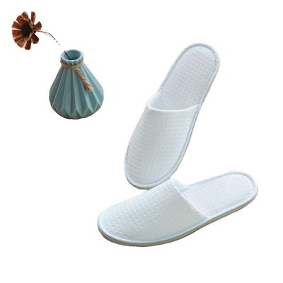 China Wholesale Hot Selling Diposable Amazon Disposable Hotel Waffle Slippers No Logo Eco Custom Womens Men Indoor Bedroom Spa Slippers For Hotels for sale