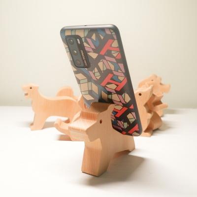 China Multifunctional Chinese Wooden Mobile Phone Holders Animal Zodiac Wooden Crafts For Home Decoration for sale