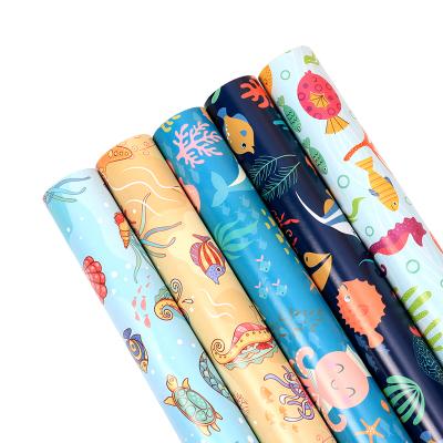 China Disposable Stylish Cartoon Design Gift Wrapping Paper With Marine Organism Pattern Printed For Kid for sale