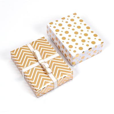 China Gold Stamping 50*70cm Printed Disposable Gift Wrapping Paper Hot Sheet For Lover Gift Wrapping Book Cover for sale