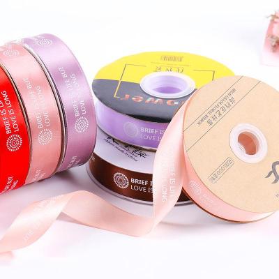 China Polyester 2.5CM*50Y Solid Color Soft Classic Ribbon With Silk Screen Printing Satin Ribbon Roll for sale