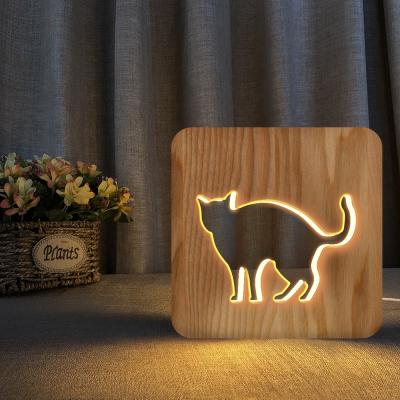 China Customizable LED Hollow Carved Small Wooden Book Light Two Wooden Book Light Holiday Birthday Gift Dolphin Shaped Night Lamp for sale