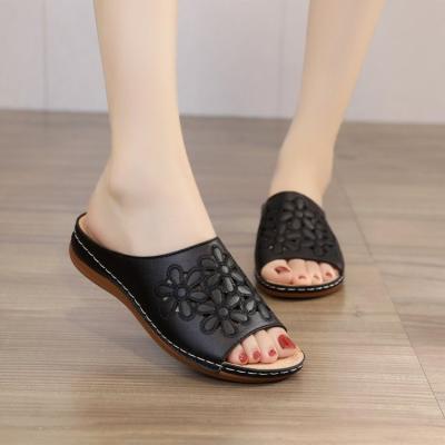 China 2022 factory trend fashion fashion PU slippers wholesale hollow sandals women's casual flat flower slippers for sale