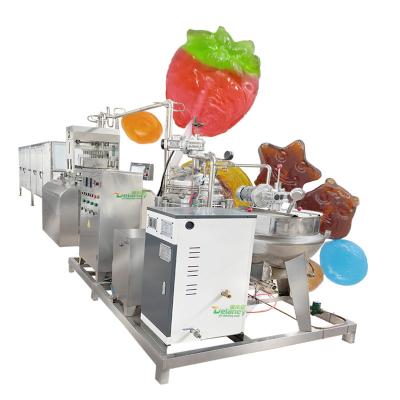 China Food automatic 300kg/h silicon servo filling PLC control rainbow flat ball shape lollipop candy machine for sale