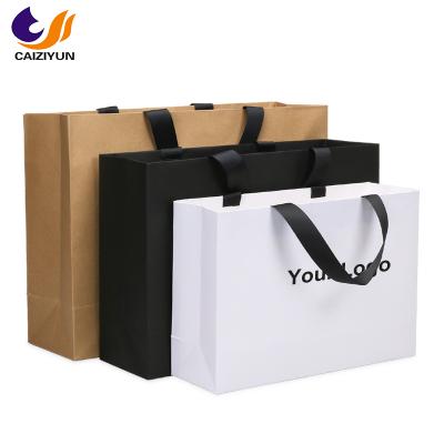 China Factory Free Sample 15 Years Factory Free Sample Luxury Custom Craft Print Foldable Gift Apparel Shopping Kraft Paper Bag With Your Own Logo for sale