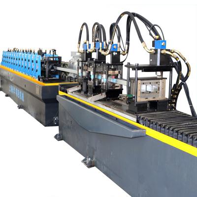 China WALL Alibaba Porcelain Metal Stud and Track Roll Forming Machine Metal Stud Roll Forming Machine Roll Forming Line for sale