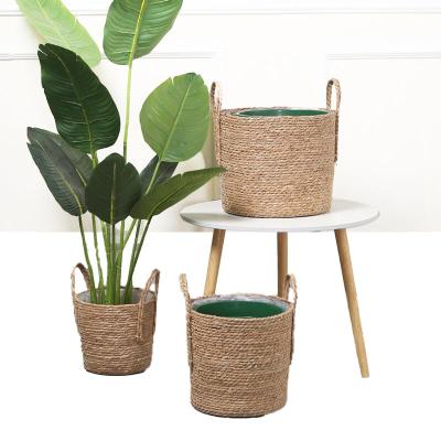 China Large cheap sustainable strawwoven storage flower basket universal straw woven flower portable basket for sale