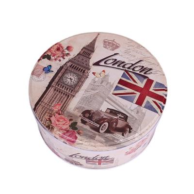 China Food custom empty small glossy painting tin cans food grade metal tin can round small  flower pattern set scented tea tin box for sale