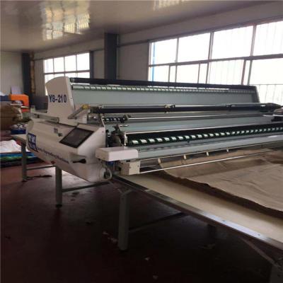 China Multi-use automatic hot sale fabric spreading machine for knit and woven fabric for sale