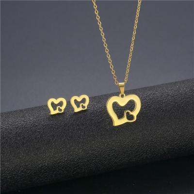 China FASHIONABLE Wholesale Cheap Jewelry Sets Stainless Steel 18k Gold Plated Hollow Heart Necklace Earrings Set Love Jewelry Sets for sale