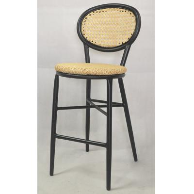 China Modern Commercial Grade Stacking Metal Rattan Hotel Bar Furniture Chair In Black Color for sale