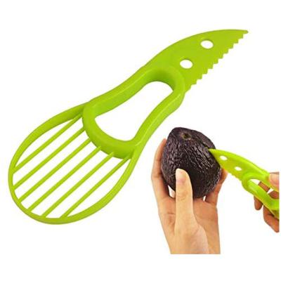 China Viable Viable Plastic Kiwi Slicer Fruit Avocado Cutter Knife Cavity Puncher Kitchen Instrument for sale