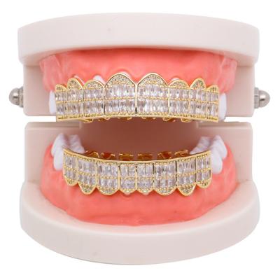 China Bling Brass Gold Plated Grillz Teeth Rectangle Zircon Fang Grillz Unisex Bling Jewelry for sale