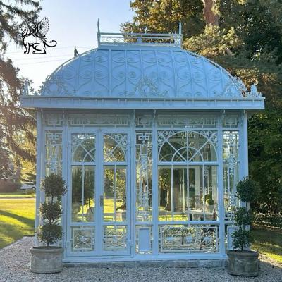 China Wrought Cast Iron Garden Gazebo White Outdoor Metal Wedding Gazebo Sunrooms Glass Houses Modern for sale