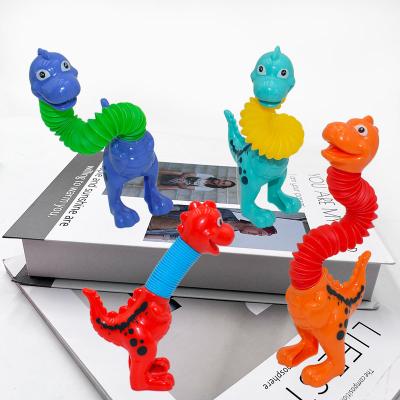 China Hot Selling Cartoon Dinosaur Decompressing Pop Tubes Wiggle Toys Annealed Tube Novel Telescopic Stabilizing Adult Desktop Stretching Tube Toys for sale