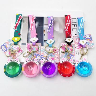 China Cute Cartoon Animal Bubble Bottles Boba Liquid Quicksand Kawaii Key Chain Fortune Cat Keychains for sale