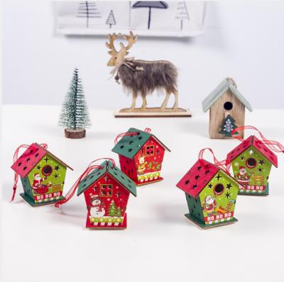 China Creative Colorful Wooden Mini Christmas Lighting Europe Wooden House Christmas Painting Decoration for sale