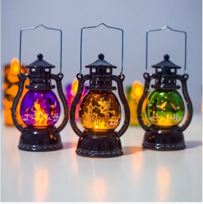 China Creative layout of plastic and metal xibao Halloween decoration small oil bar ghost festival atmosphere laser lantern retro Halloween lantern for sale