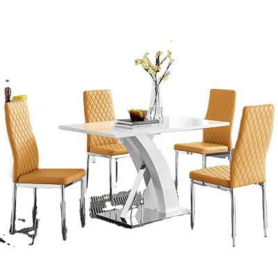 China Adjustable (Other) Shape MDF Tempered Glass Stainless Steel New Design Dining Table Set for sale