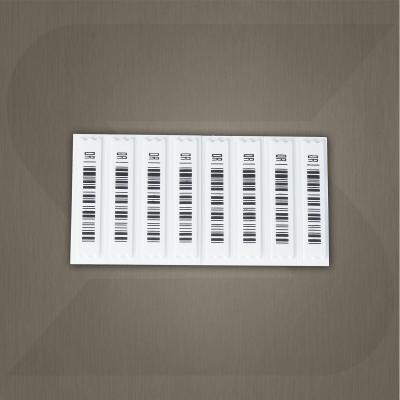 China White Back Mall Shop EAS Soft Tags Soft Security Tags With Barcode for sale