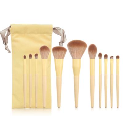 China Angular Blush Makeup Brush 11 Set Yellow Loose Powder Blush Eyeshadow Brush High Quality Professional Beauty Tool for sale