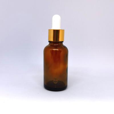 China Wholesale non refillable brown color glass essential bottle with aluminum dropper for cosmetic packaging for sale