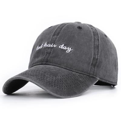 China breathable & Bad Hair Waterproof Day Letter Embroidered Washed Baseball Cap Women Men Adjustable Hat for sale