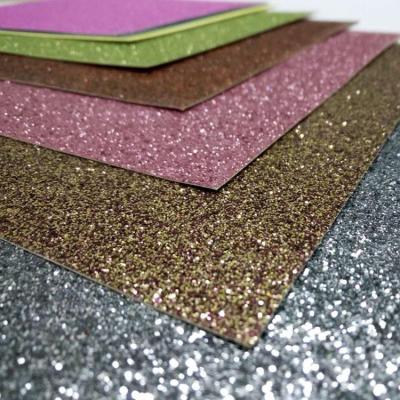 China Curl Free AOZ Approved Glitter Colored Paper For Making Cake Topper for sale