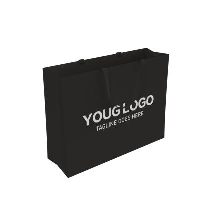 China Recyclable Luxury Black Gift Paper Bag Custom Logo Printing Kraft Paper Shopping Bag With Ribbon Handles for sale