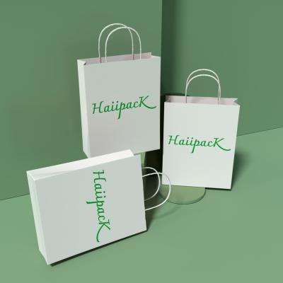 China Recyclable Custom Size Package Paper Bag With Handle Kraft Paper Shopping Bag Clothing Gift Bags Wholesale for sale