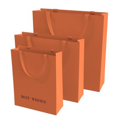 China Recyclable Richpack Fashion Retail Luxury Shopping Orange Paper Bag For Custom Logo With Handle for sale