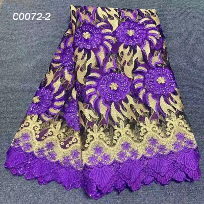 China 2021 Good Quality Viable Nigerian Nigerian Embroidery Cotton Tulle Lace Fabric Women Dress Flowers With Stones for sale