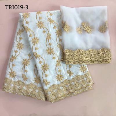 China Best price bazin fabrics stones bazin riche anti-static nigerian white african brocade fabric matching blouse for sale