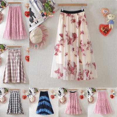 China 2023 new breathable high waist skirt female autumn and winter printed large swing skirt floral a line knit skirt in long style for sale