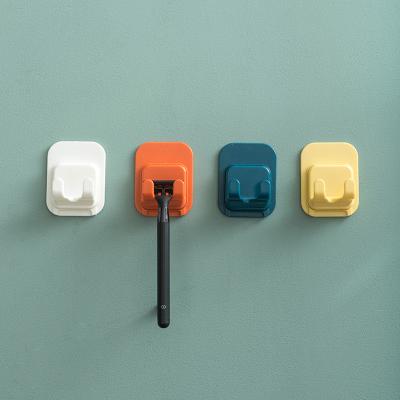 China Sustainable Waterproof Multi Function Plastic Razor Holder Sticky Wall Hook for sale