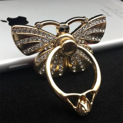 China 360 Degree Rotating Metal Mobile Phone Ring Holder Stand Gold Plating With Rhinestone for sale