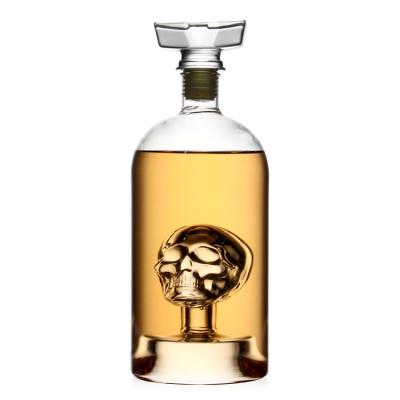 China 750ml Beverage Skull Inside Design Glass Wine Liquor Vodka Bottle Glass Decanter for sale