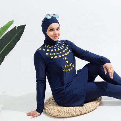 China Contrast Color Anti-UV Women Swimsuit Cutout Laser DRIVE Muslim Burkini Swimwear and Beachwear with Lining for sale