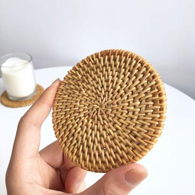 China Sustainable Handmade Rattan Coaster Wholesale Round 10cm Decorative Natural Rattan Drink Coasters With Stand for sale