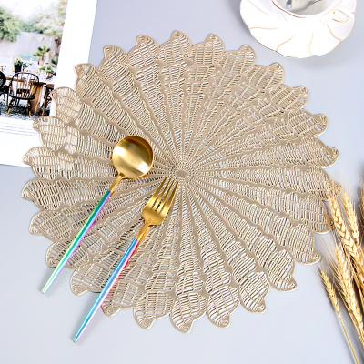 China Vinyl Serving Tableware Flower Design PVC Sustainable Food Coaster Cavity Mat Metallic Placemat for sale