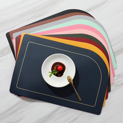 China 2021 New Design Stocked Shaped Leather Table Mat Custom Faux Printed Pu Leather Place Mat With Gold Printed for sale