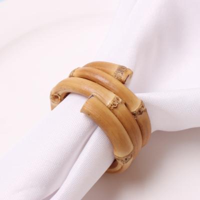 China Sustainable Rattan Circular Napkin Simple Bamboo Ring Buckle Bamboo Napkin Ring For Party for sale