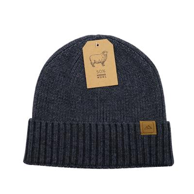 China COMMON Promotional Good Quality Merino Wool Beanie Hat For Cold Winter With Folded Leather Label for sale