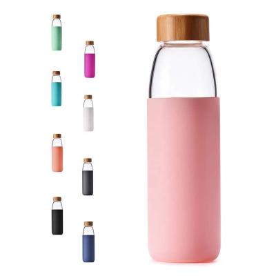 China Sustainable Bamboo Lid 18oz Eco - Friendly Silicone Sleeve Borosilicate Glass Durable Water Bottle for sale