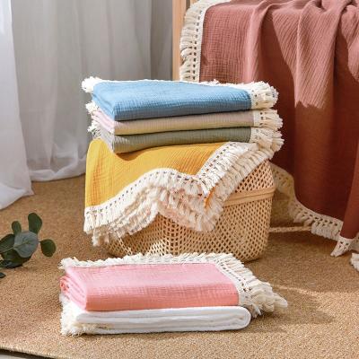 China Anti-Static Gauze Quilt Muslin Cotton Newborn Baby Toddler Trim Fringe Tassel Baby Boy/Girl Infant Blanket With Tassel Ruffle Wraps for sale