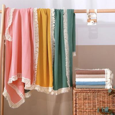 China Wholesale Anti-Static Gauze Blanket Solid Cozy Muslin Summer Baby Lightweight Cotton Wraps With Tassels for sale